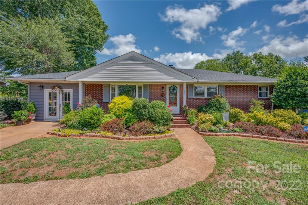 176 Crestview Street Rutherfordton, NC 28139 - Photo 8 of 38 front view of a house with a yard