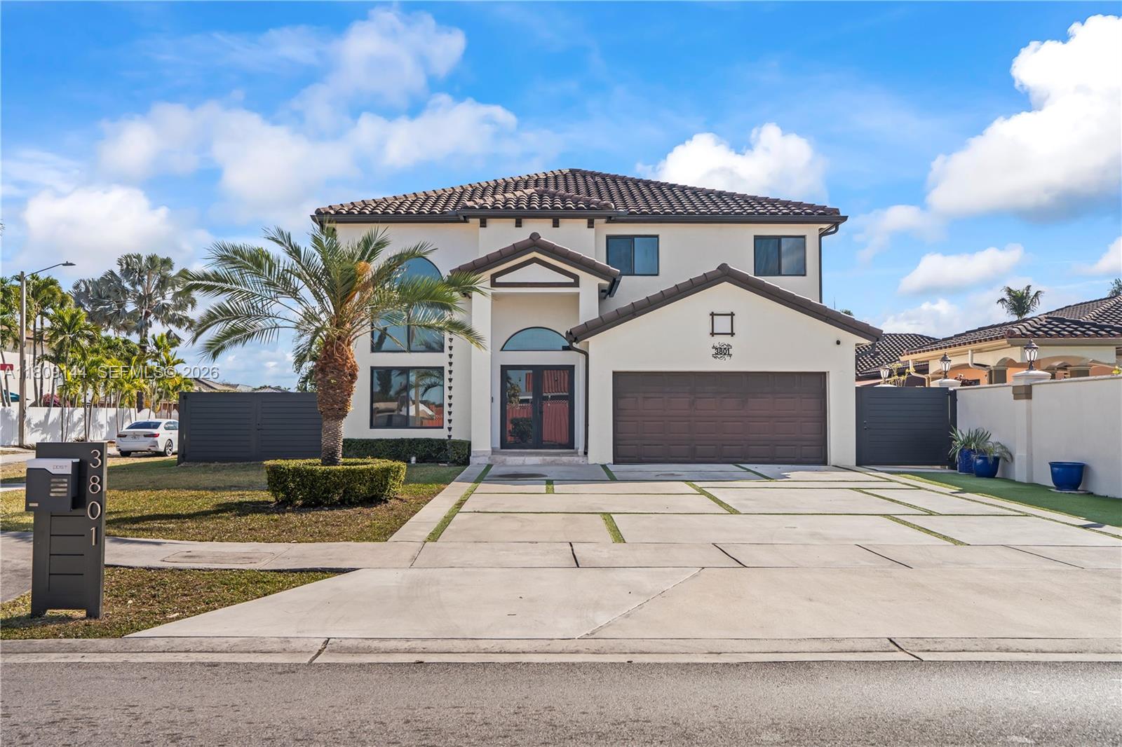 3801 Southwest 149th Avenue Miami, FL 33185 - Photo 1 of 41 a front view of a house with yard