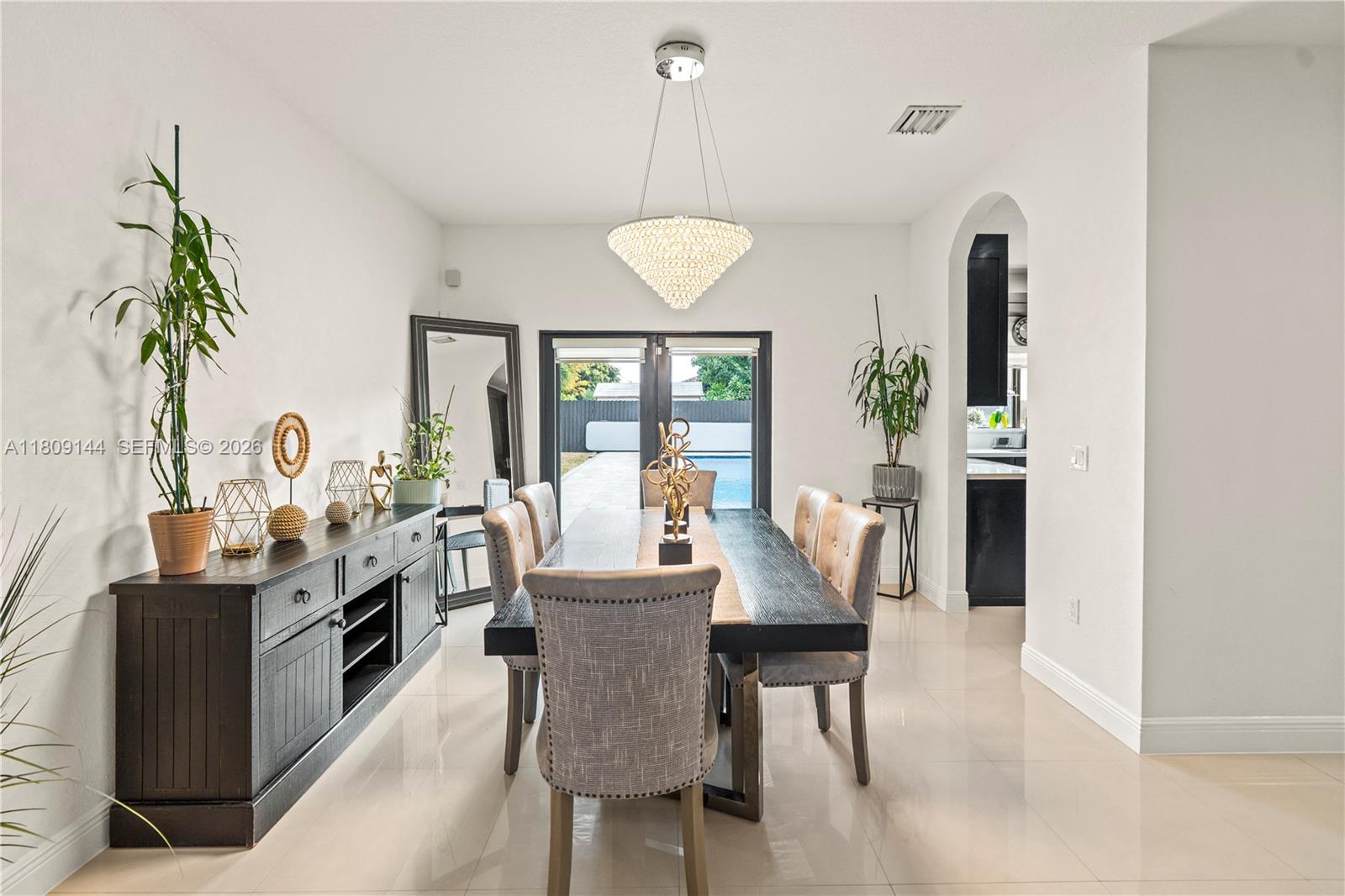3801 Southwest 149th Avenue Miami, FL 33185 - Photo 12 of 41 a view of a dining room with furniture window and outside view