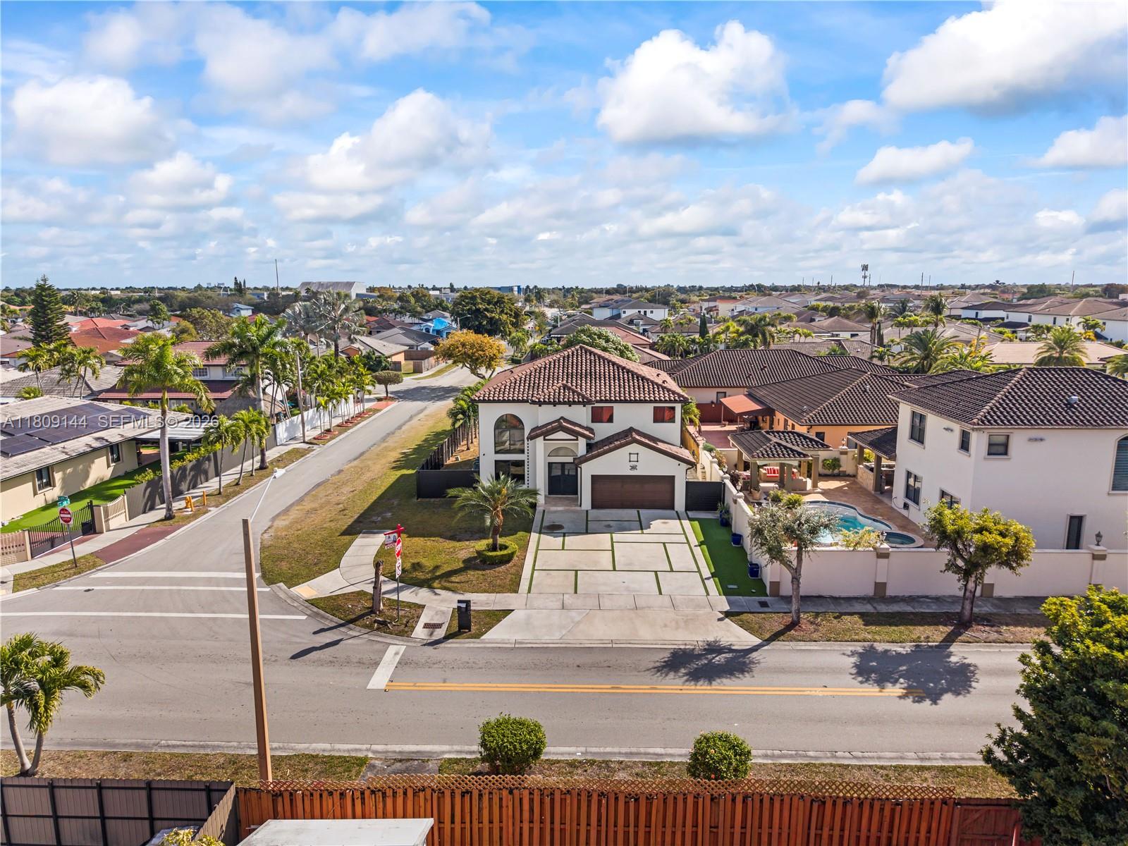 3801 Southwest 149th Avenue Miami, FL 33185 - Photo 31 of 41 a view of a city with lawn chairs