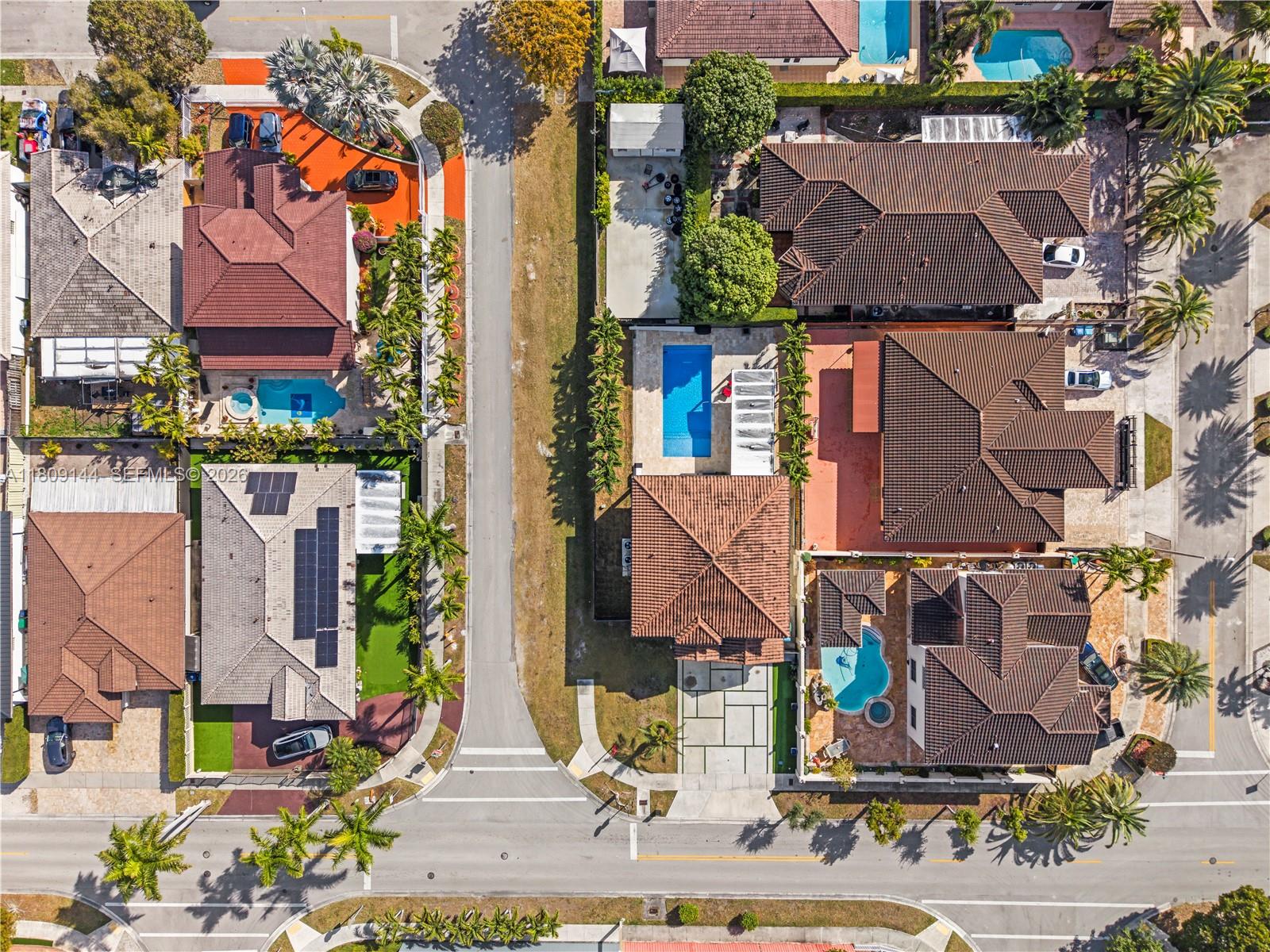3801 Southwest 149th Avenue Miami, FL 33185 - Photo 33 of 41 an aerial view of houses with yard