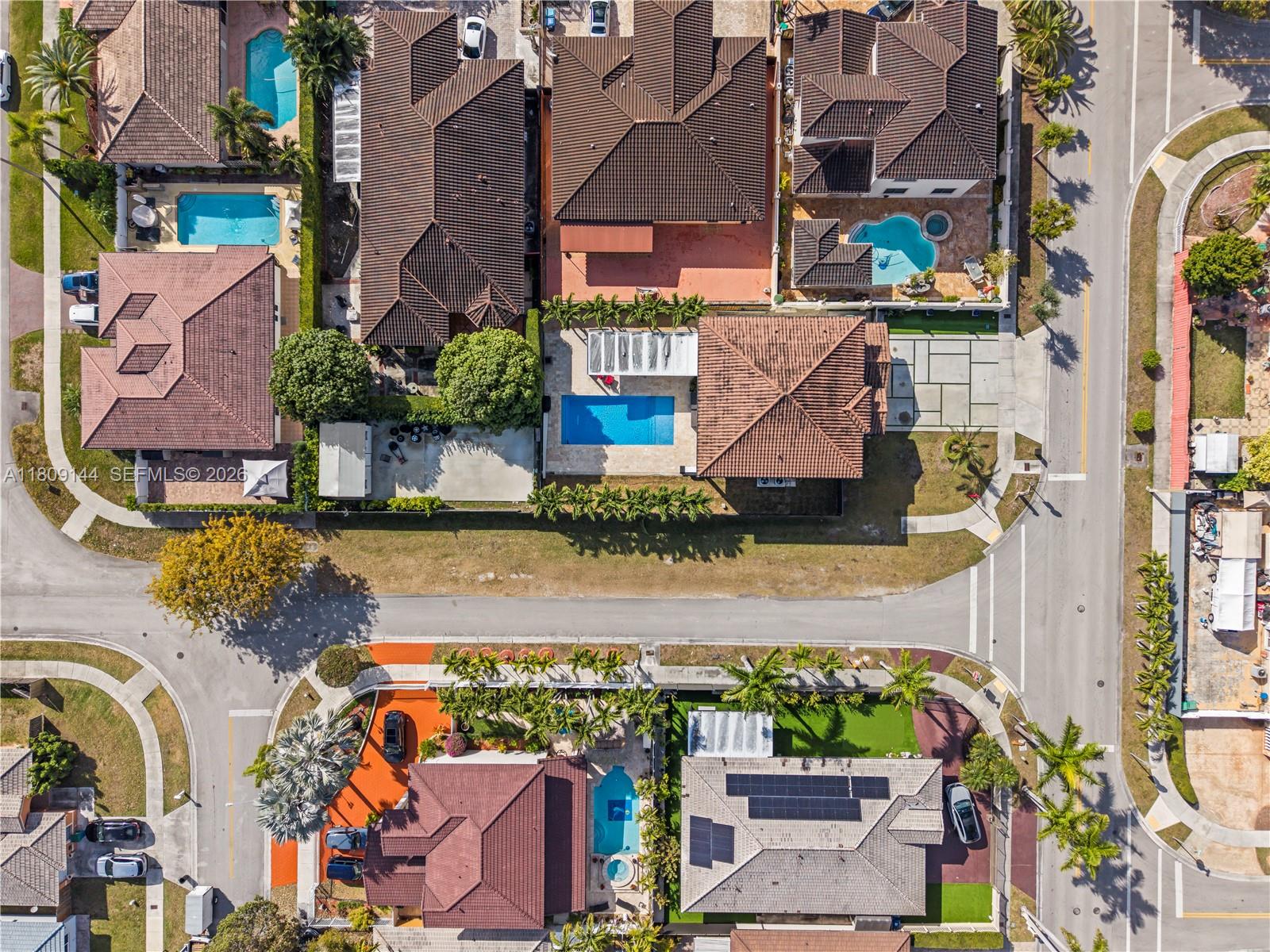 3801 Southwest 149th Avenue Miami, FL 33185 - Photo 34 of 41 an aerial view of residential houses with outdoor space