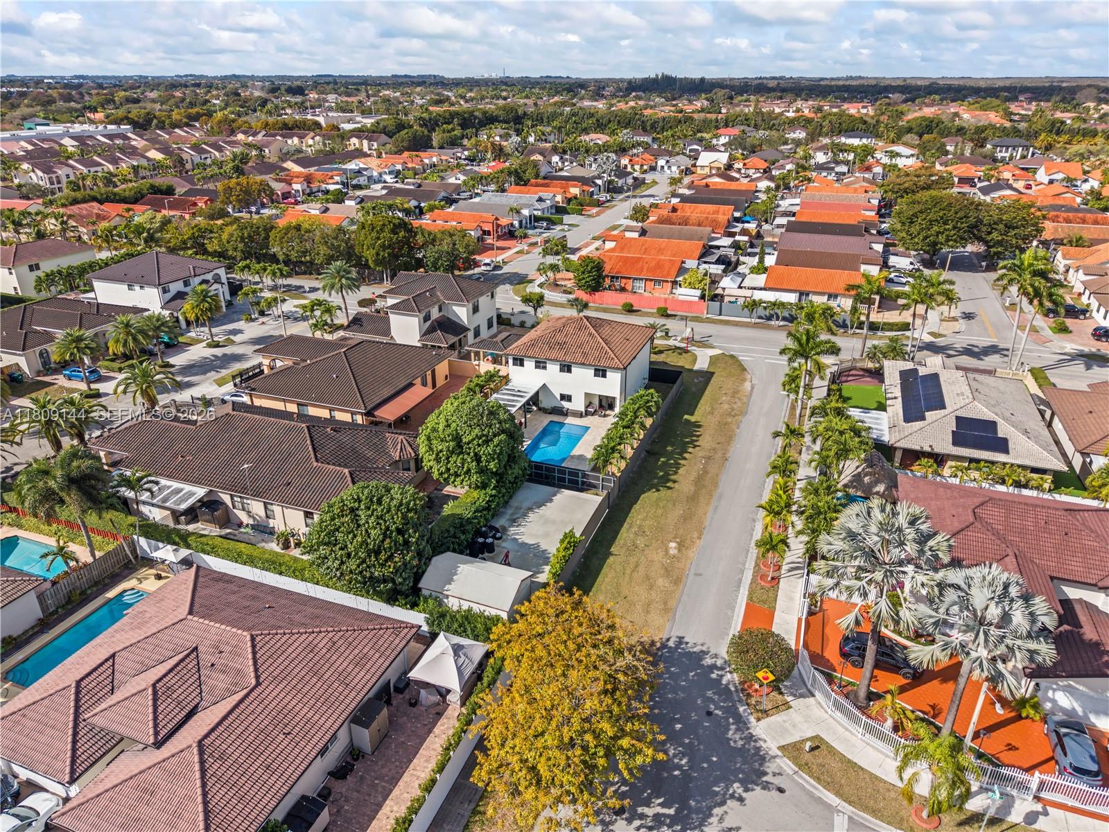3801 Southwest 149th Avenue Miami, FL 33185 - Photo 35 of 41 an aerial view of residential houses with outdoor space