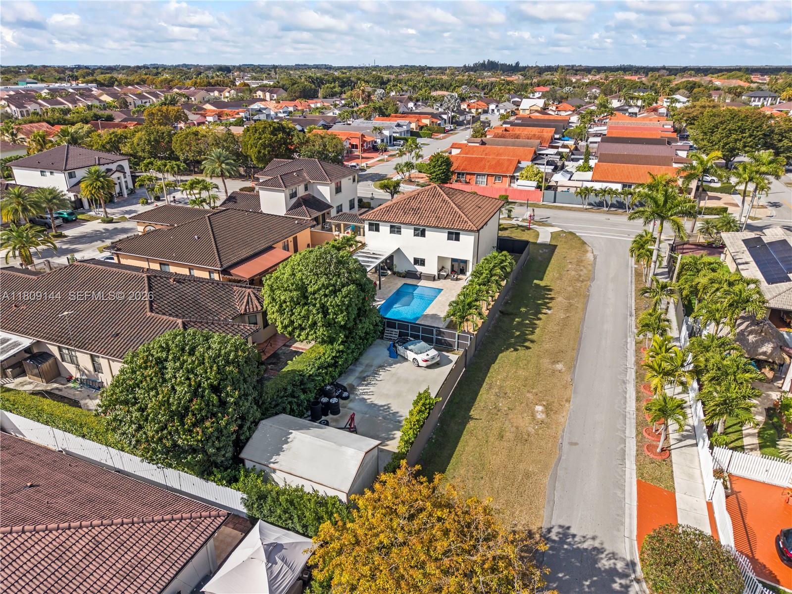 3801 Southwest 149th Avenue Miami, FL 33185 - Photo 36 of 41 an aerial view of residential houses with outdoor space