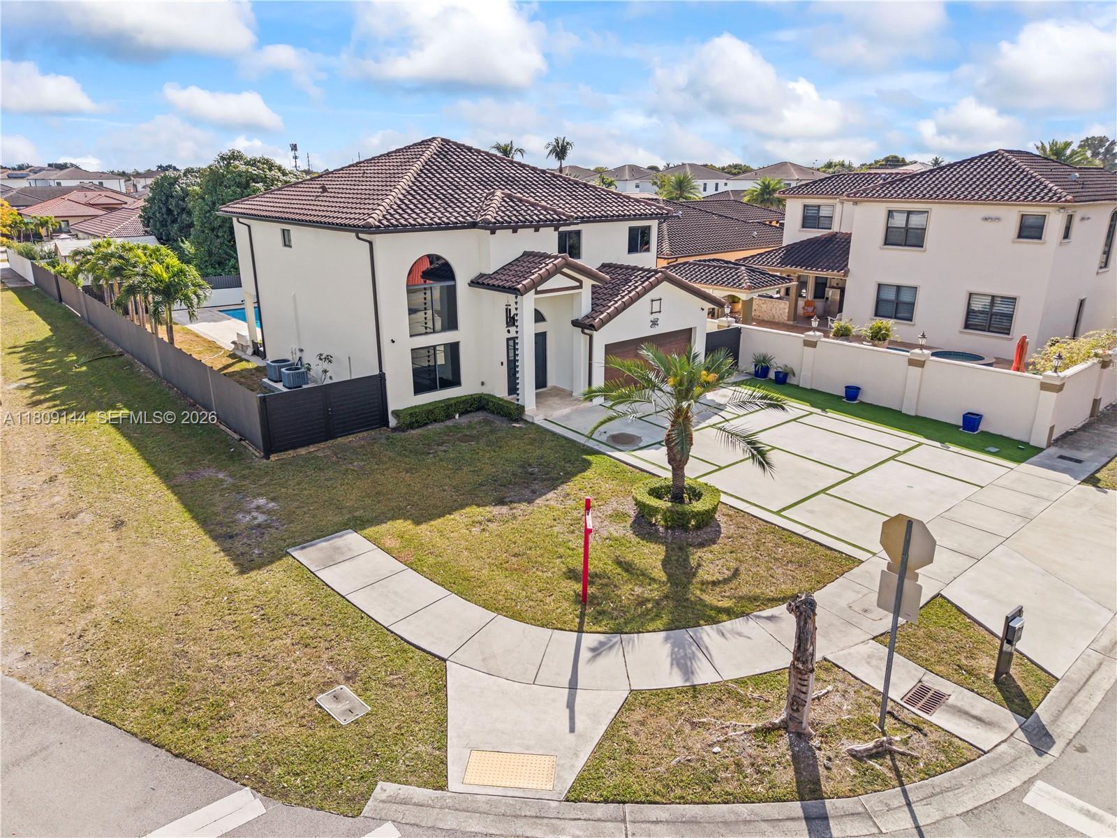 3801 Southwest 149th Avenue Miami, FL 33185 - Photo 41 of 41 a view of a house with backyard and sitting area