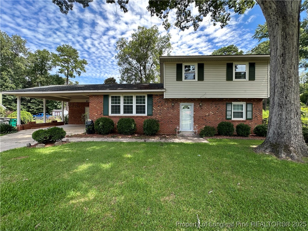 front view of a house with a yard