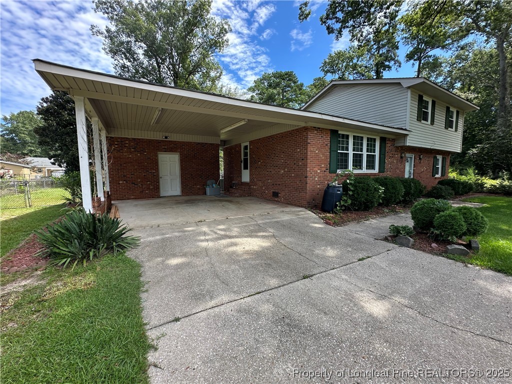 3120 Hampstead Road Lumberton, NC 28360 - Photo 2 of 30 a front view of a house with garden