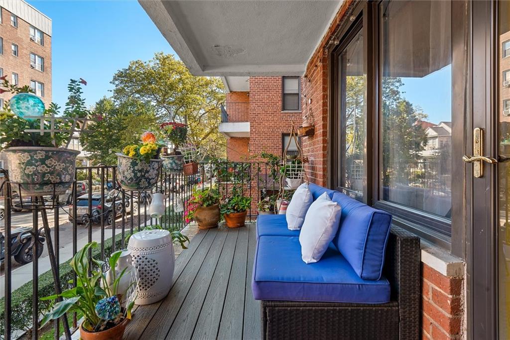 7401 Shore Road, Unit 1E Brooklyn, NY 11209 - Photo 9 of 21 a view of balcony with seating space and potted plants