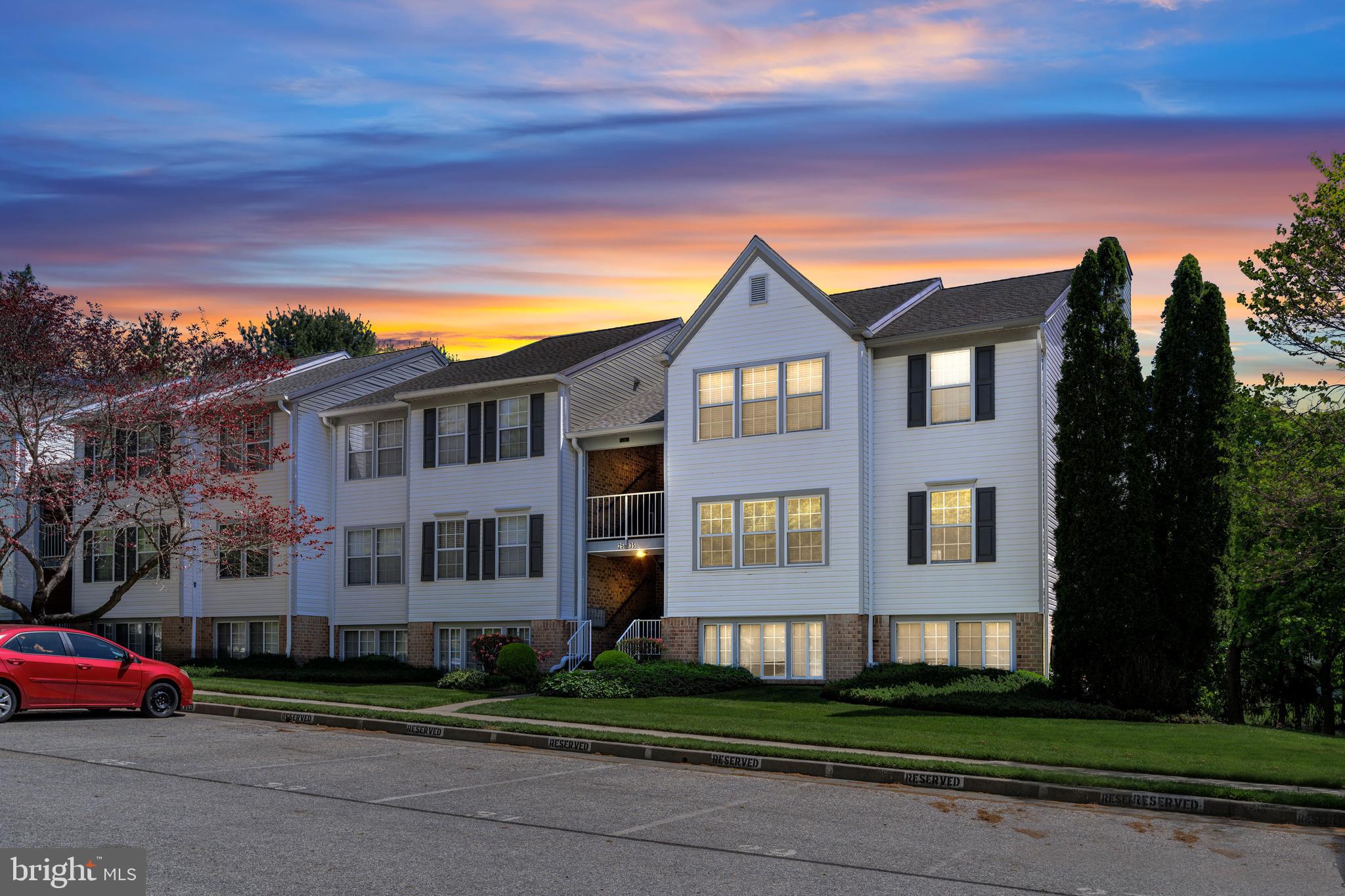 31 Beagle Run, Unit 88 Nottingham, MD 21236 - Photo 2 of 43 a front view of a house with a garden