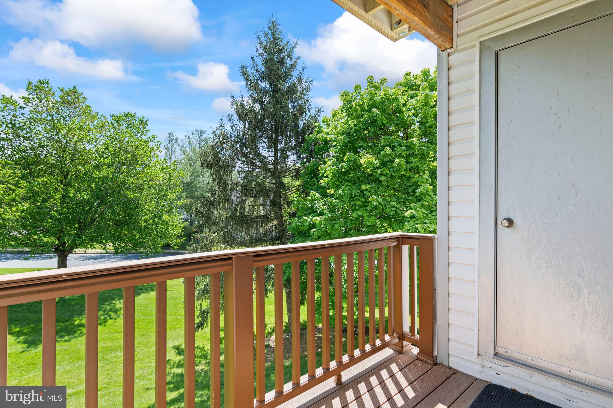 31 Beagle Run, Unit 88 Nottingham, MD 21236 - Photo 21 of 43 a view of a balcony with wooden floor