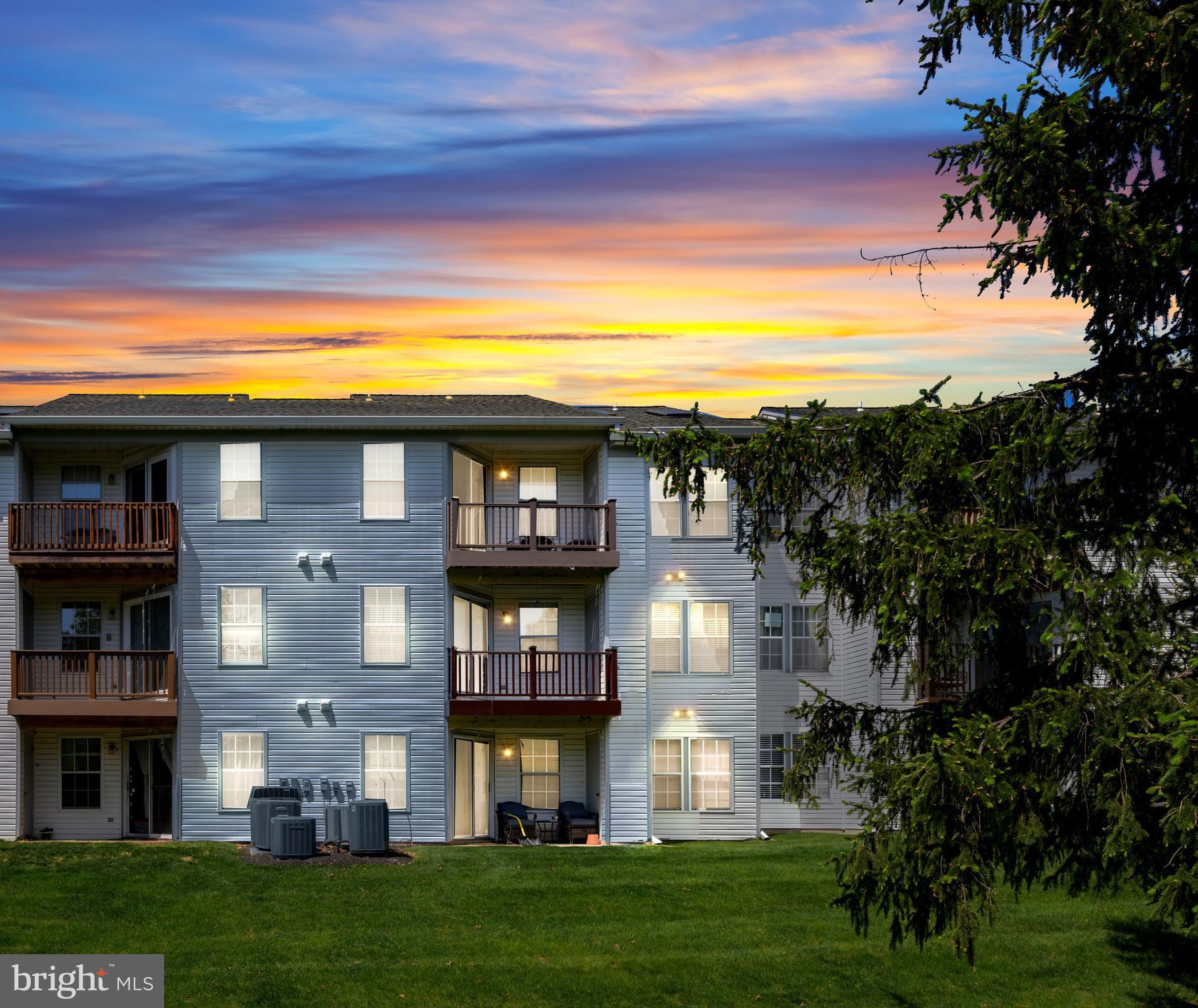 31 Beagle Run, Unit 88 Nottingham, MD 21236 - Photo 3 of 43 a view of a brick building next to a yard