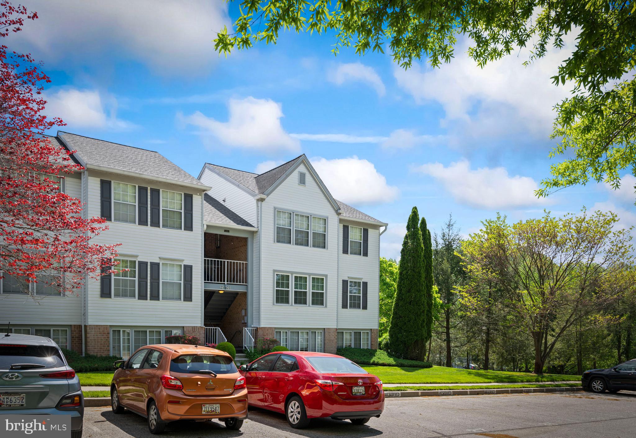 31 Beagle Run, Unit 88 Nottingham, MD 21236 - Photo 39 of 43 a front view of a residential apartment building with a yard