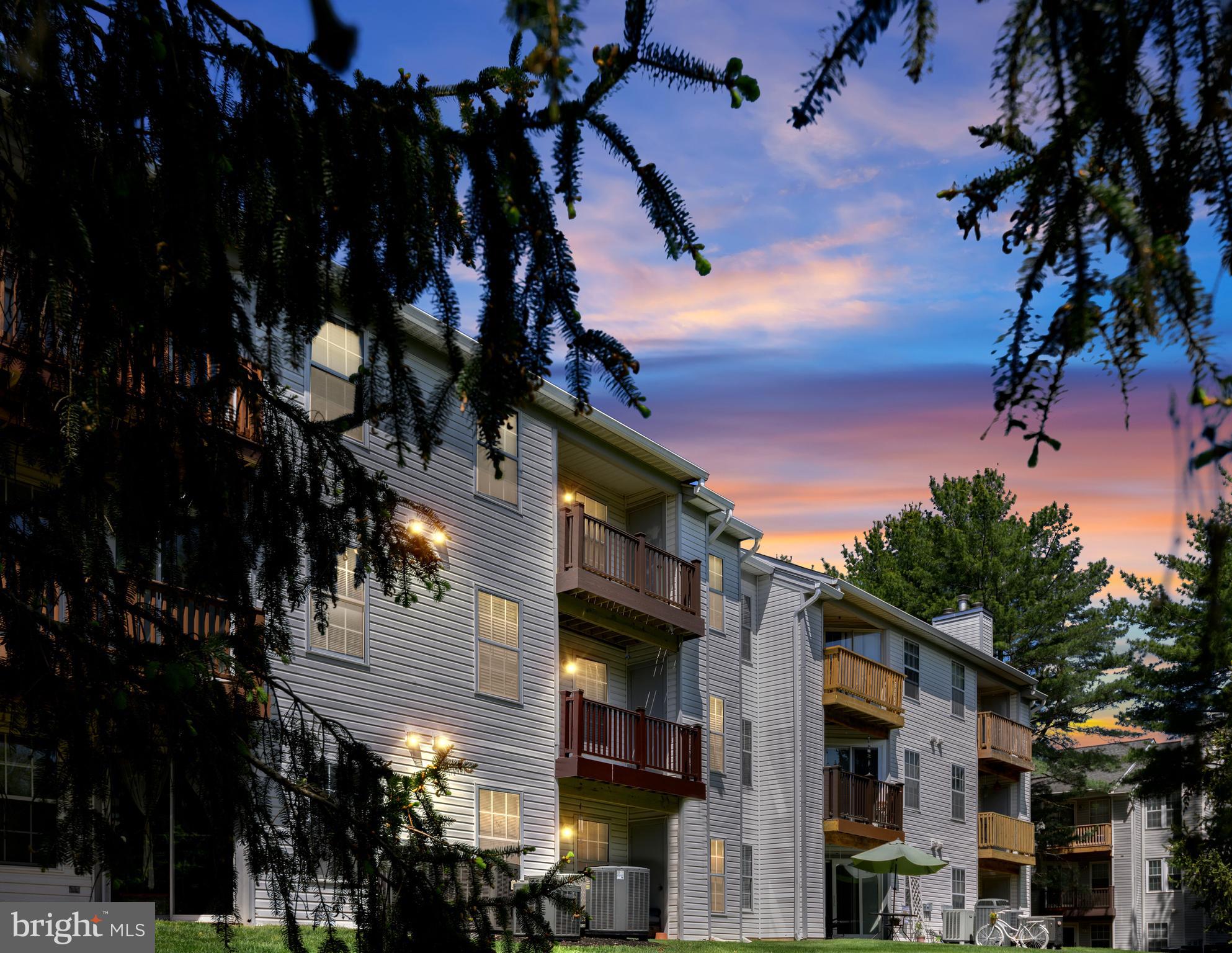 31 Beagle Run, Unit 88 Nottingham, MD 21236 - Photo 4 of 43 a city street lined with tall buildings