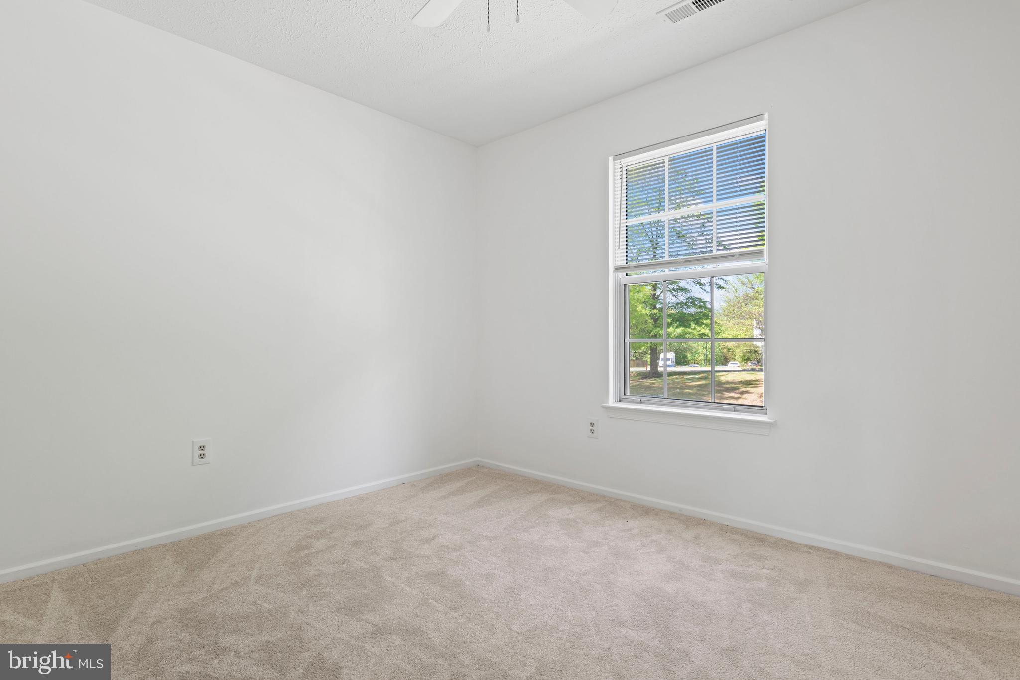 31 Beagle Run, Unit 88 Nottingham, MD 21236 - Photo 10 of 43 an empty room with windows