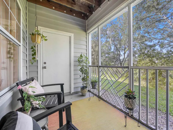 a view of a porch with furniture