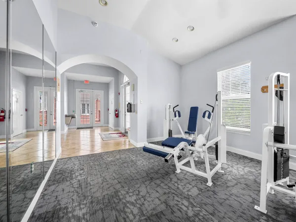 a view of a livingroom with furniture and a rug