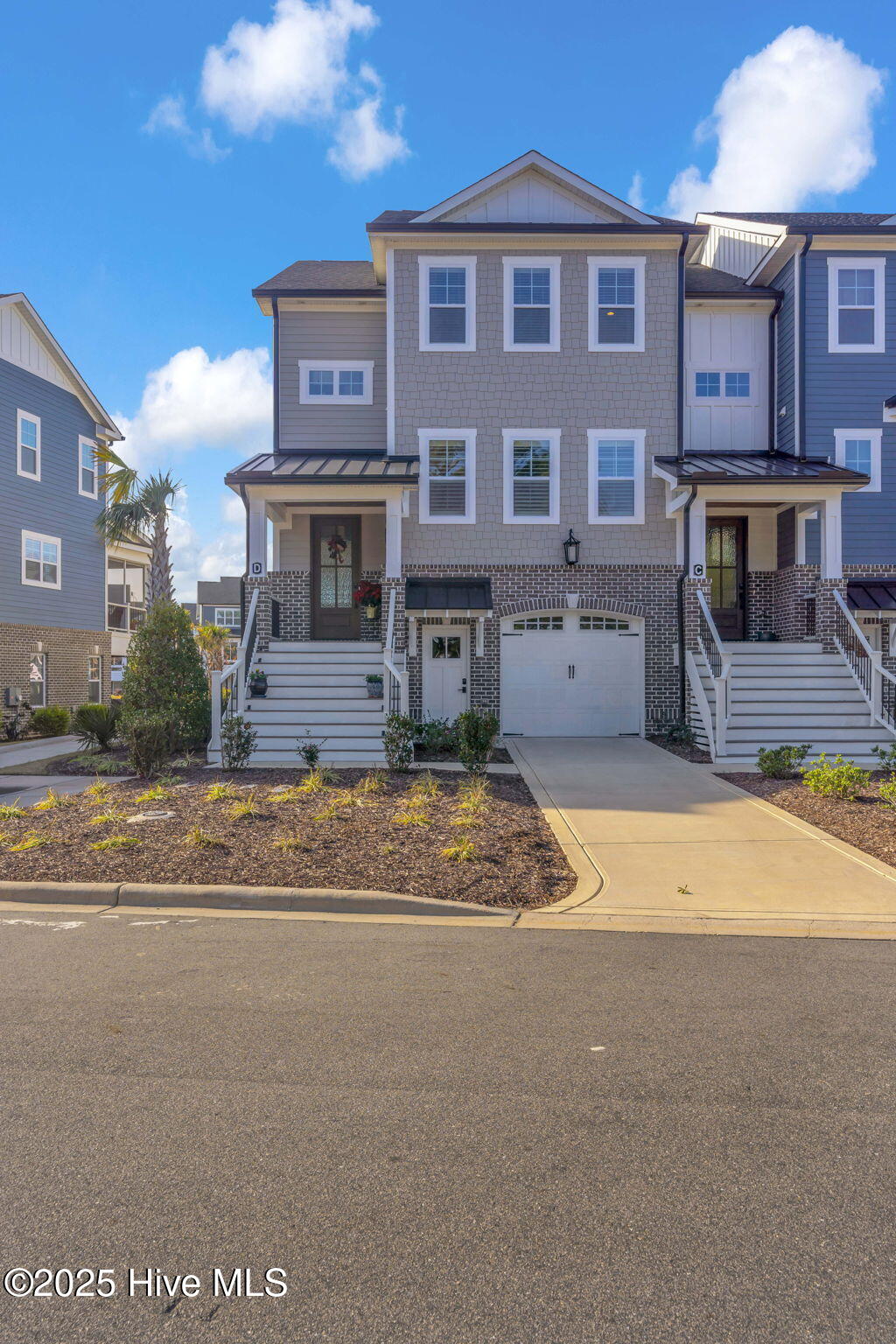 The home presents stunning curb appeal with its elevated architectural features and well-maintained exterior, creating a striking first impression.