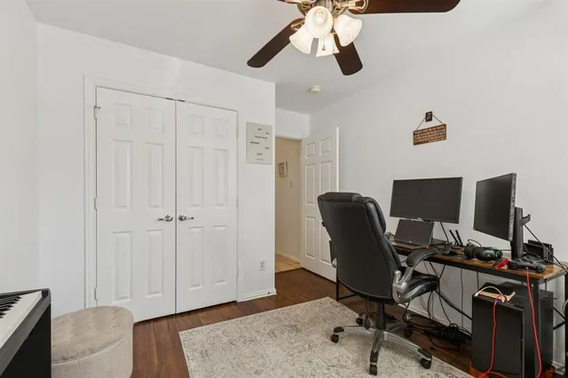 a view of a workspace with furniture