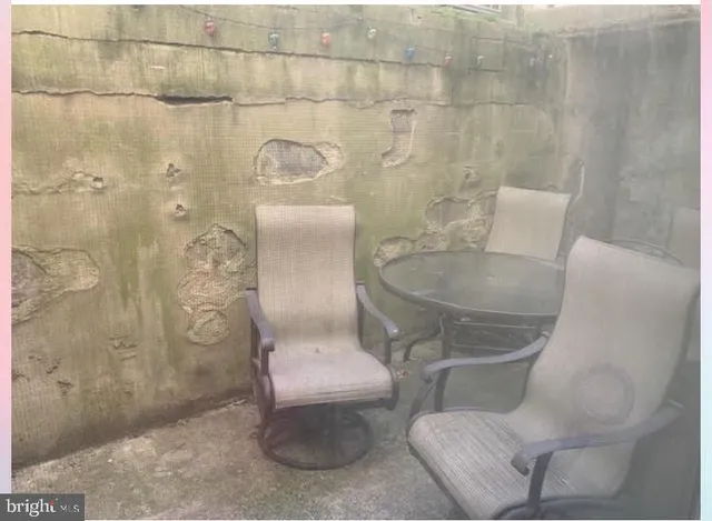 a bathroom with a toilet and shower