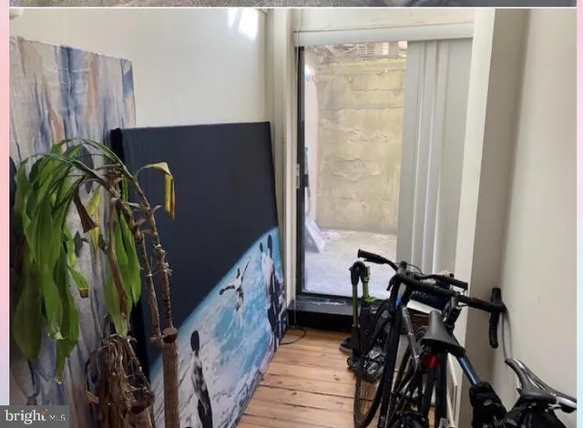 a view of a balcony with furniture