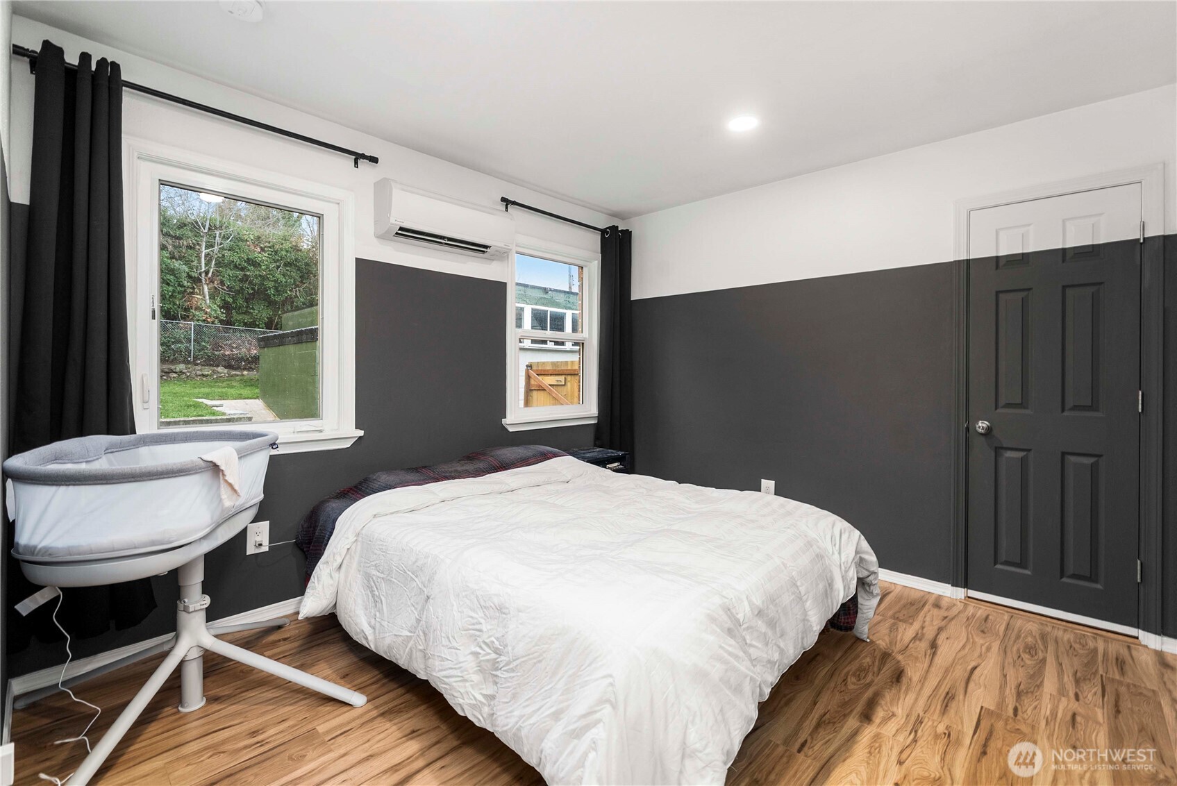 3608 South L Street Tacoma, WA 98418 - Photo 14 of 40 a bedroom with a bed and a window