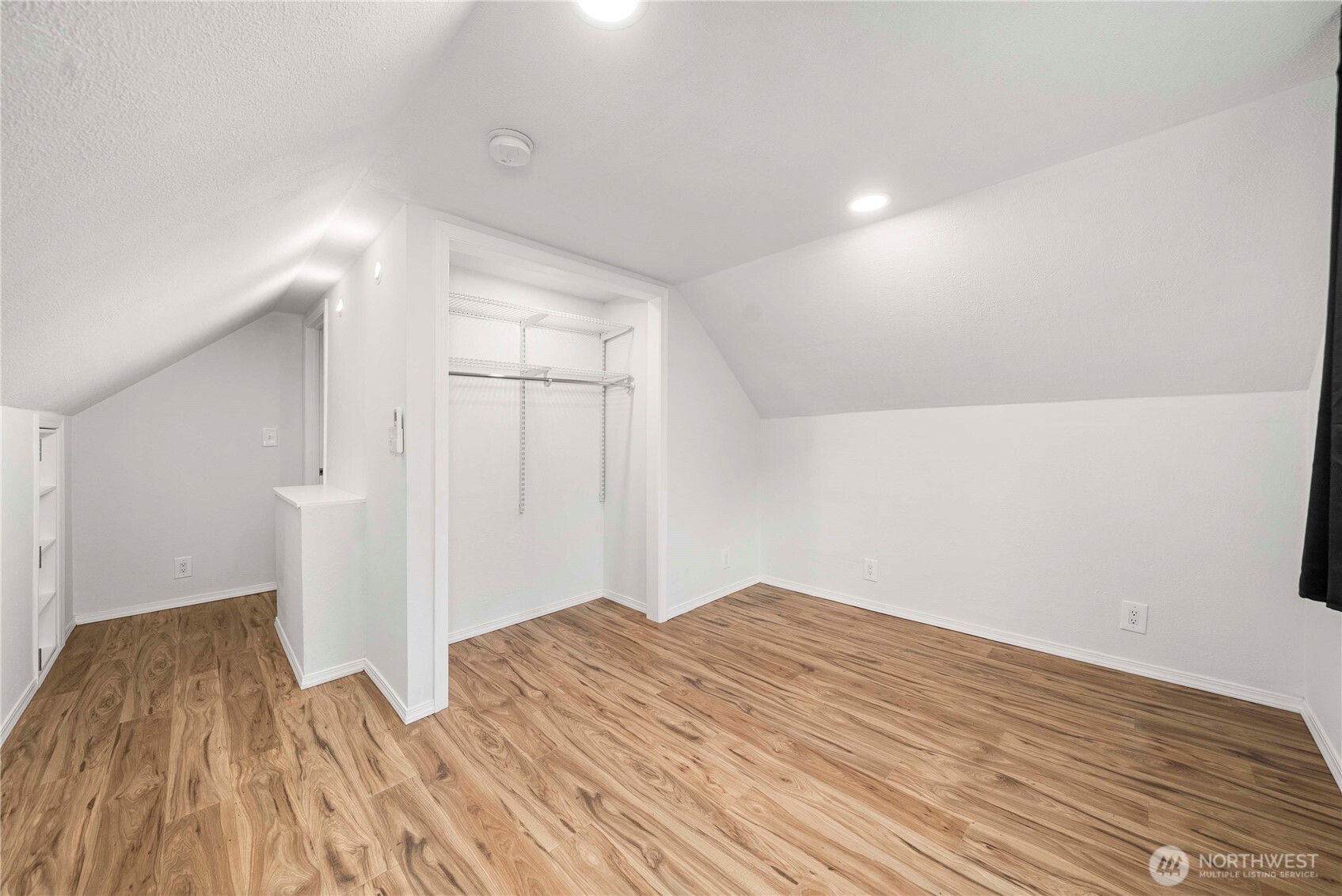 3608 South L Street Tacoma, WA 98418 - Photo 19 of 40 a view of empty room with wooden floor