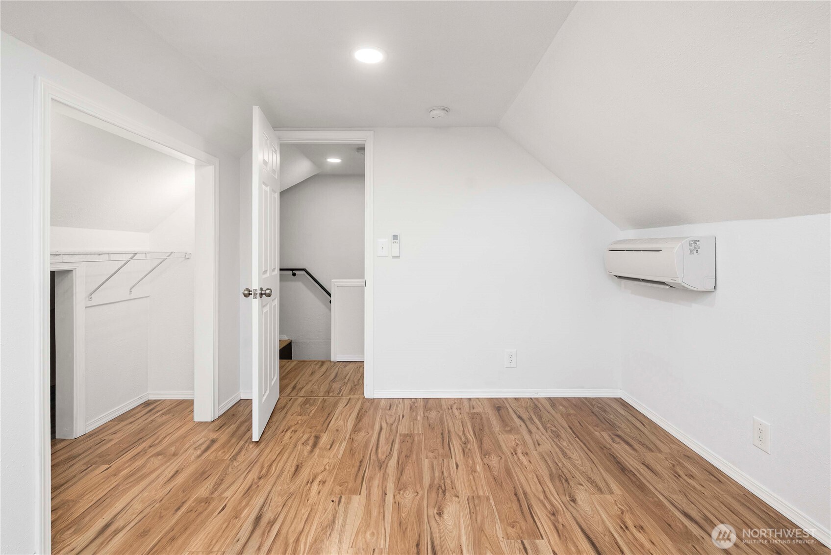 3608 South L Street Tacoma, WA 98418 - Photo 21 of 40 a view of a room with wooden floor and a ceiling fan
