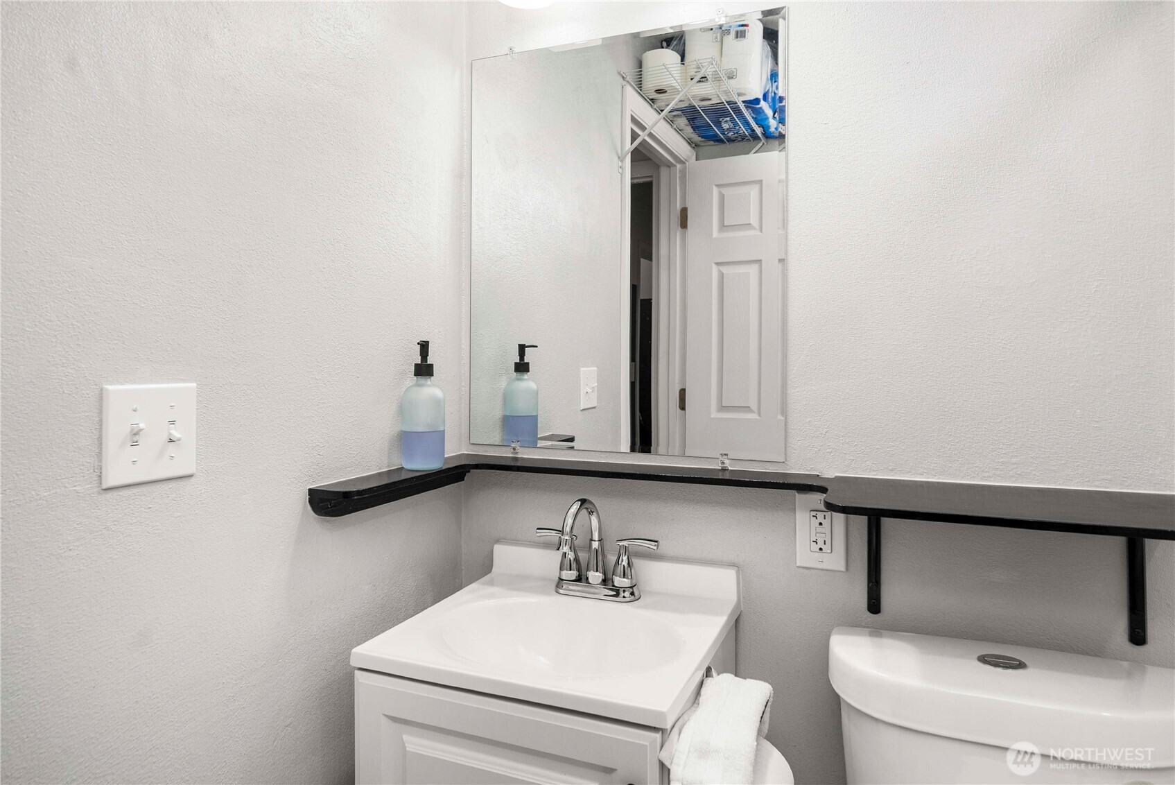 3608 South L Street Tacoma, WA 98418 - Photo 23 of 40 a bathroom with a sink and a toilet