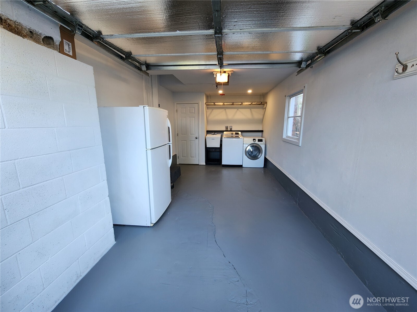 3608 South L Street Tacoma, WA 98418 - Photo 25 of 40 a view of a refrigerator in a room