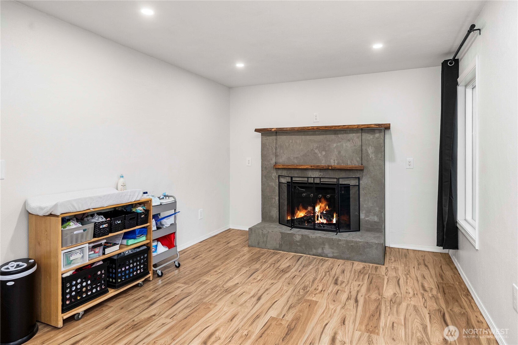 3608 South L Street Tacoma, WA 98418 - Photo 4 of 40 a living room with furniture and a fireplace