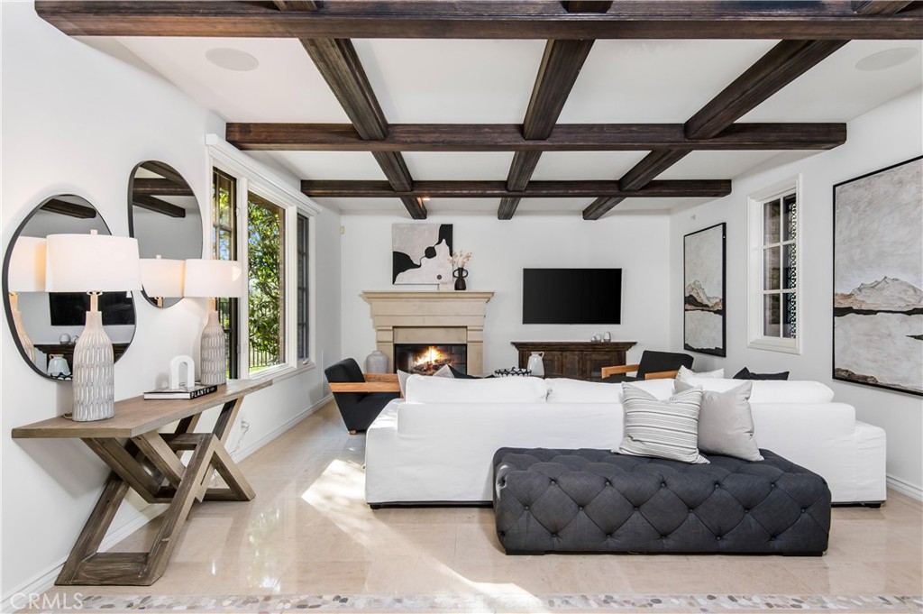 6 Pacific Winds Newport Coast, CA 92657 - Photo 3 of 10 a living room with furniture and a flat screen tv