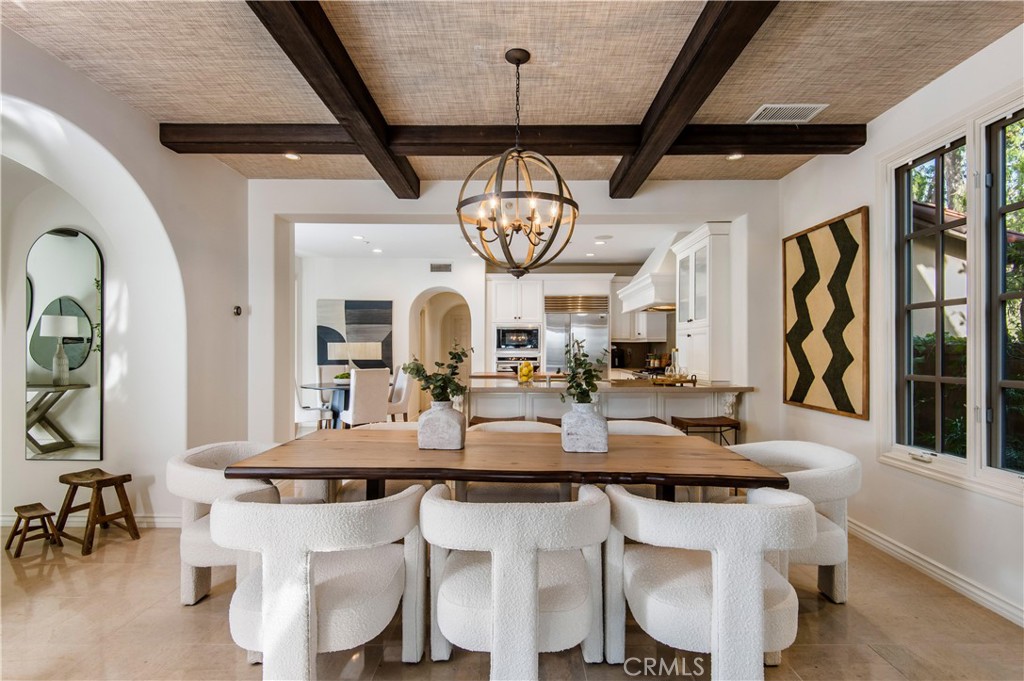 6 Pacific Winds Newport Coast, CA 92657 - Photo 5 of 10 a view of a dining room with furniture window and a chandelier