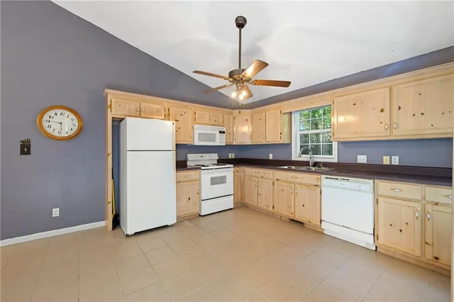 a backyard of a house with seating space