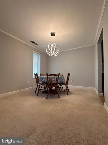 a kitchen with granite countertop a sink and a stove top oven