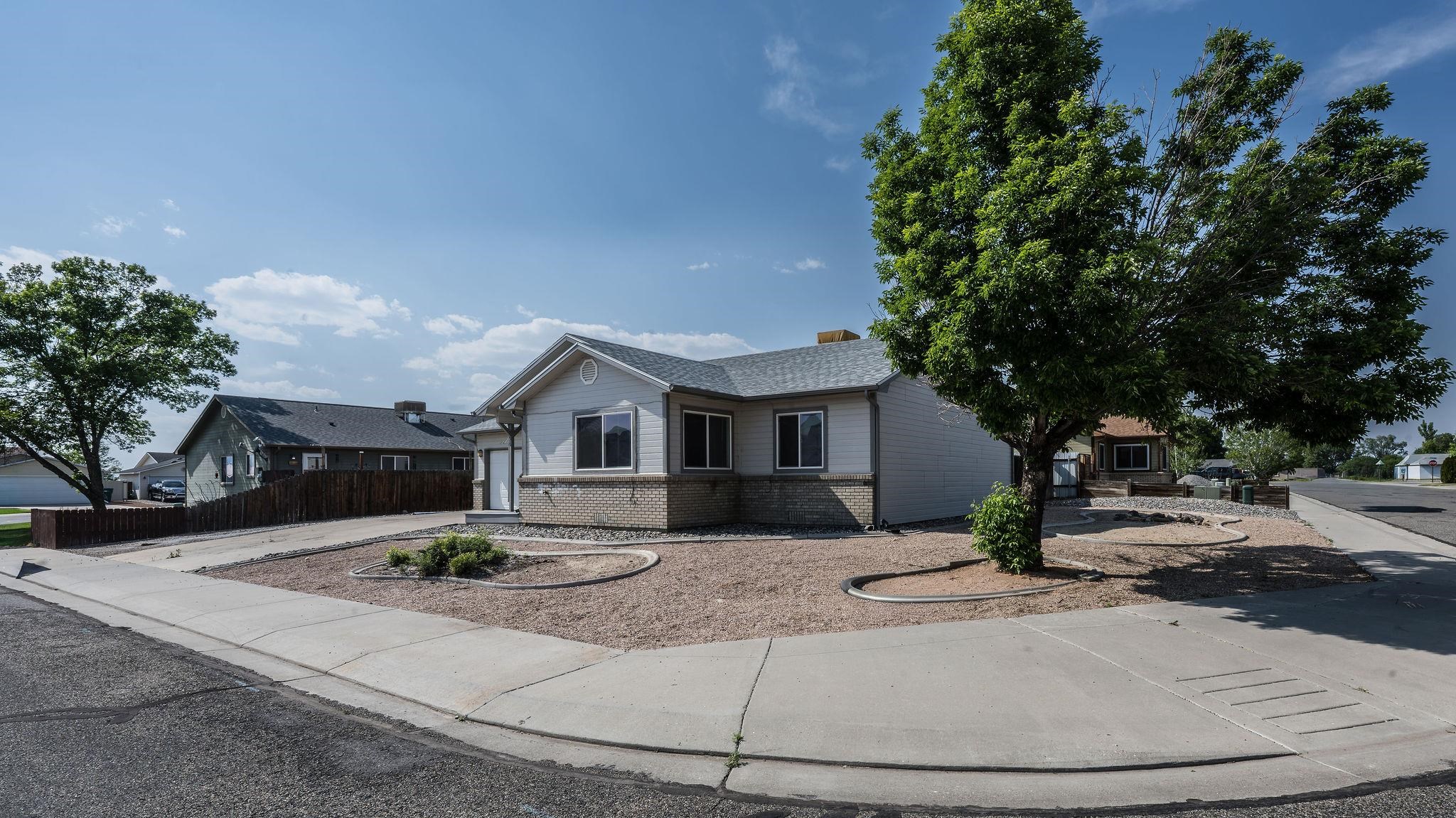 455 David Court Fruita, CO 81521 - Photo 18 of 28 a view of a house with a yard