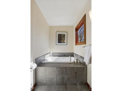 a bathroom with a sink and a bathtub