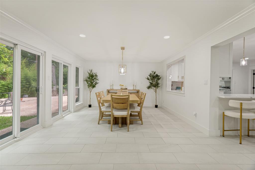 4316 Springbranch Drive Benbrook, TX 76116 - Photo 16 of 39 Spacious dining area featuring light-toned tile flooring and white walls