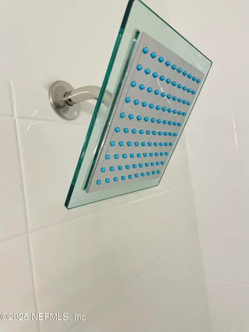 a kitchen with a sink and a refrigerator