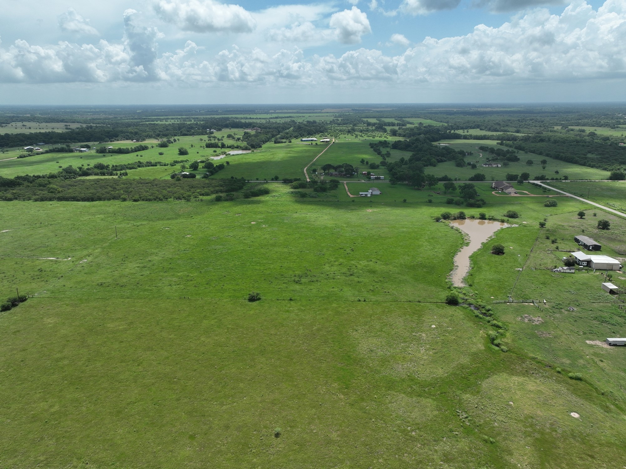 0 Lisa May Road Bellville, TX 77418 - Photo 14 of 14 a view of a lake with a city