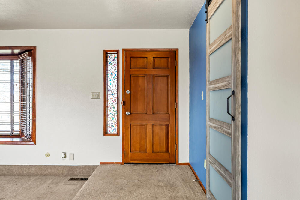 23131 North Poe Valley Road Klamath Falls, OR 97603 - Photo 8 of 45 a view of front door with a door
