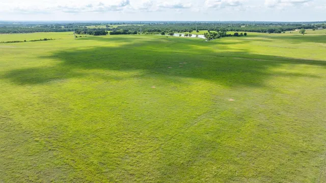 a view of an ocean and a city