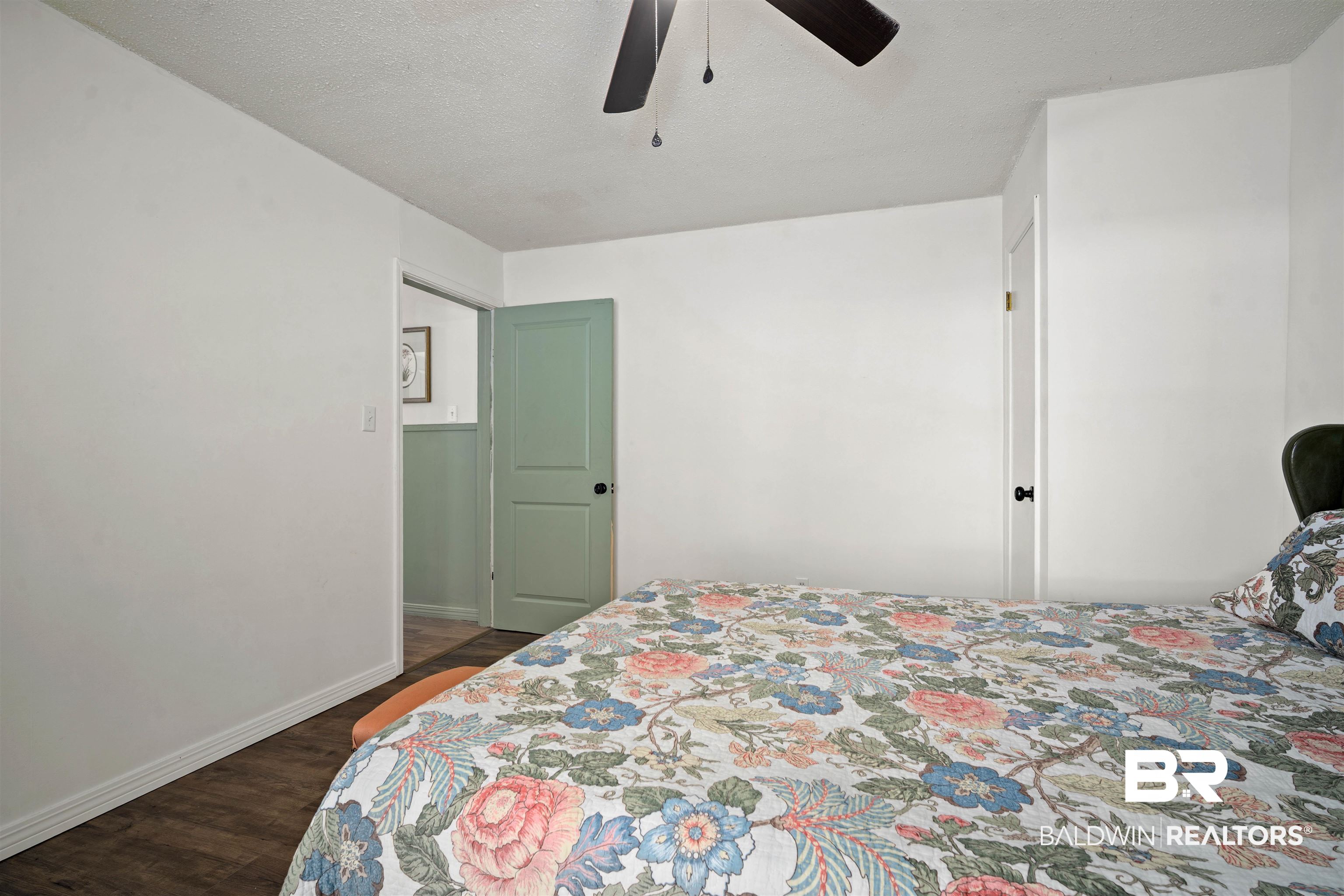 22 Horace Odom Road Millry, AL 36558 - Photo 24 of 39 Bedroom featuring dark wood-style floors, ceiling fan, and a textured ceiling