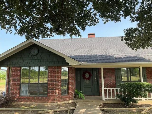 a house view with a outdoor space