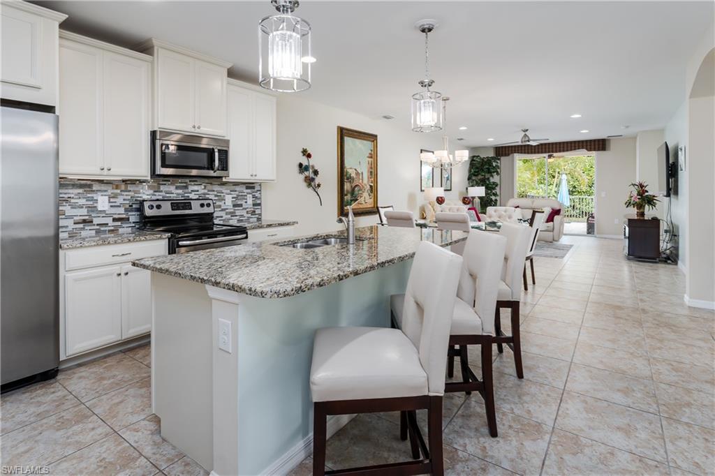 14943 Edgewater Circle Naples, FL 34114 - Photo 1 of 50