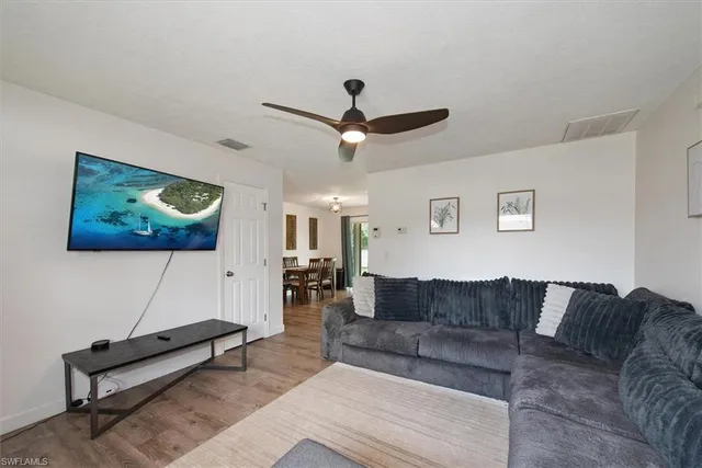 a living room with furniture and a couch