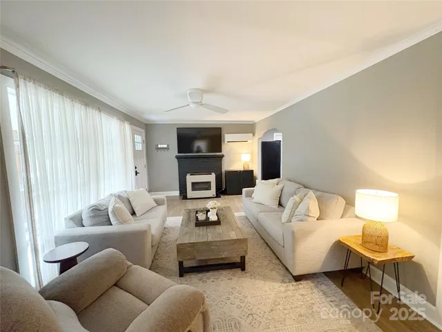 a living room with furniture and a couch