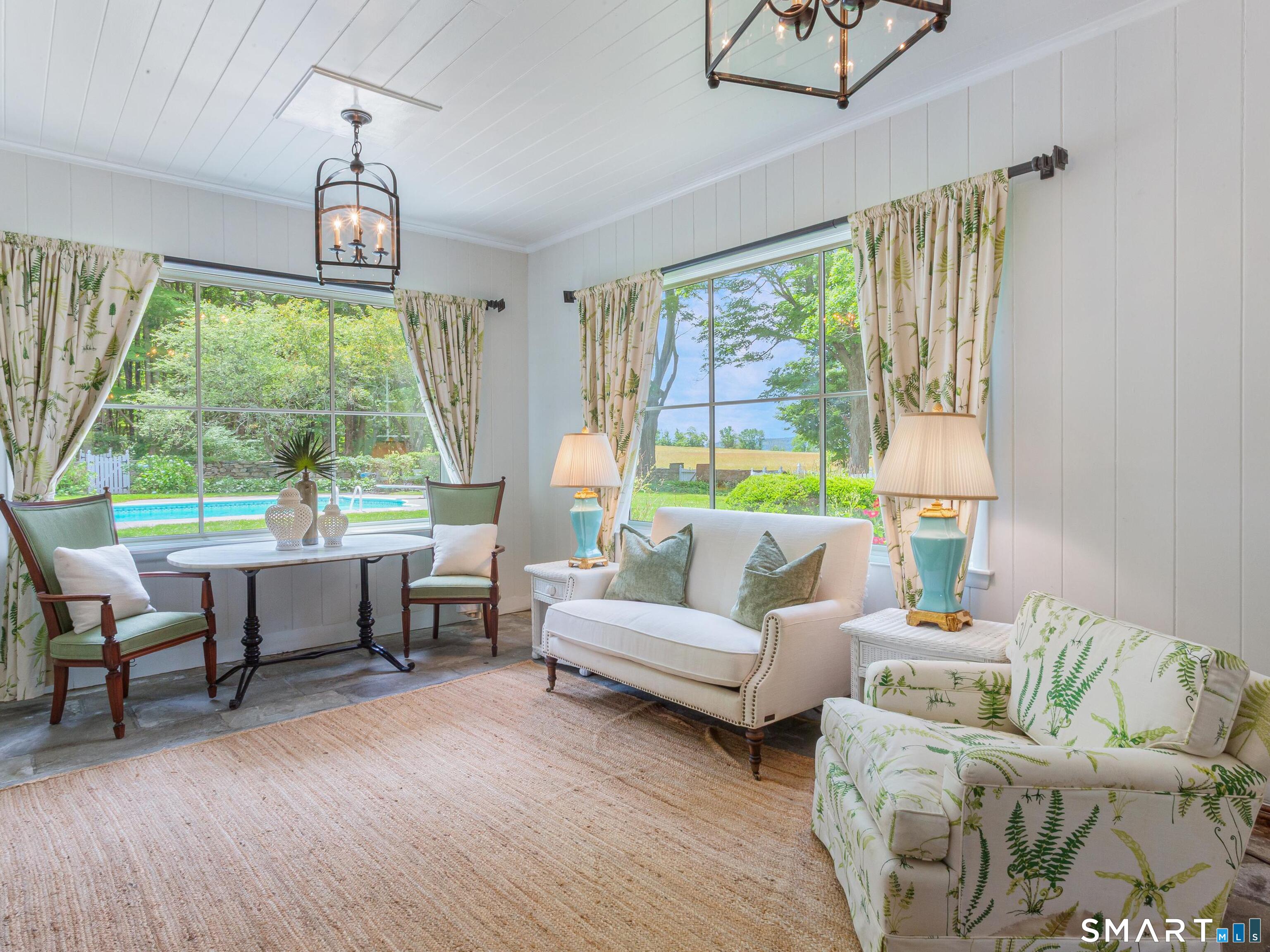 433 Wrights Crossing Road Pomfret Center, CT 06259 - Photo 11 of 40 All-season sunroom providing beautiful pool vistas, perfect for unwinding any time.