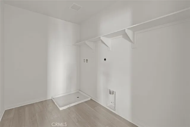 a bathroom with 2 sink toilet and a mirror