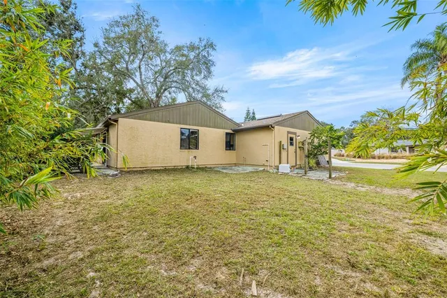 a bathroom with a sink and a yard