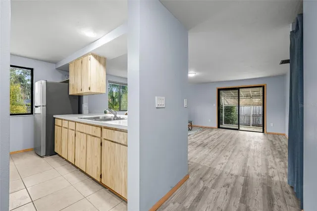 a bathroom with a sink a mirror and a bathtub